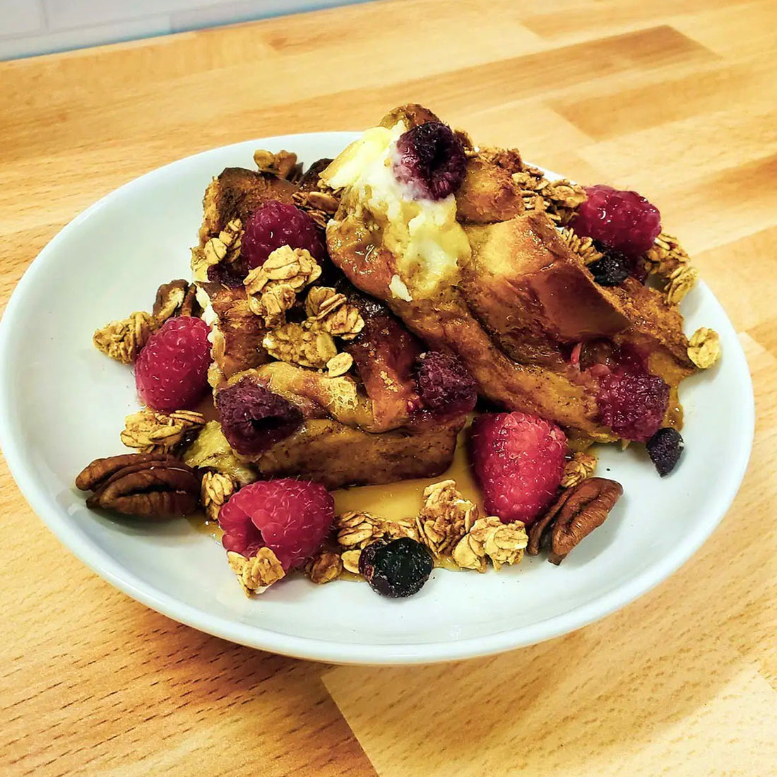 Raspberry Cheesecake French Toast Bake With Cosmopolitan Granola