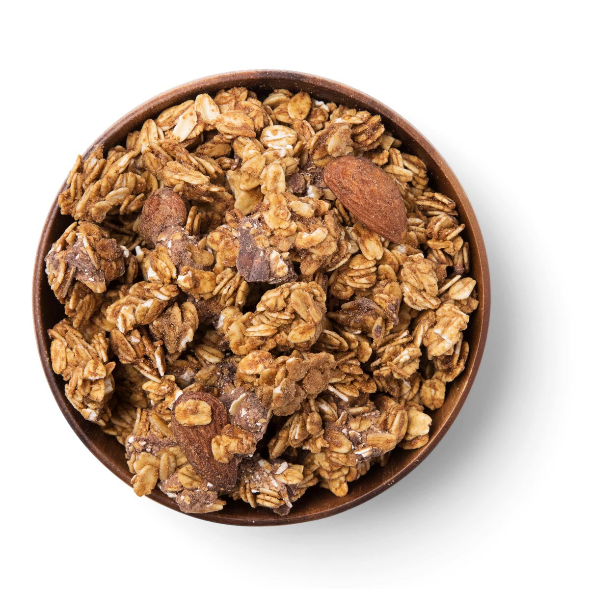 Wooden bowl filled with granola on a white background