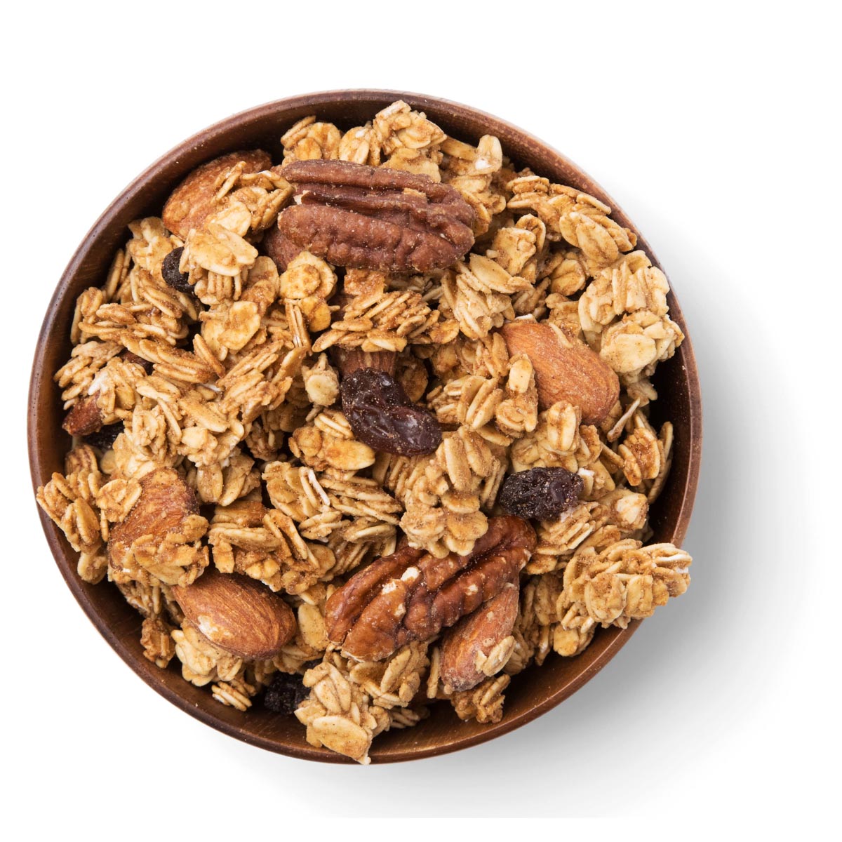 Bowl of granola with nuts and raisins on a white background
